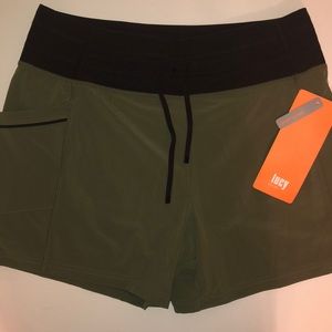 Brand New Lucy Olive Revolution Run 5” Shorts S